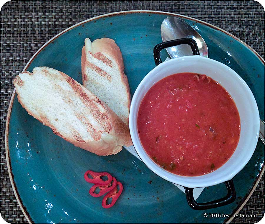 `Суп с мини-осьминогами, подается с хрустящим багетом` в `Il Forno` - фото блюда