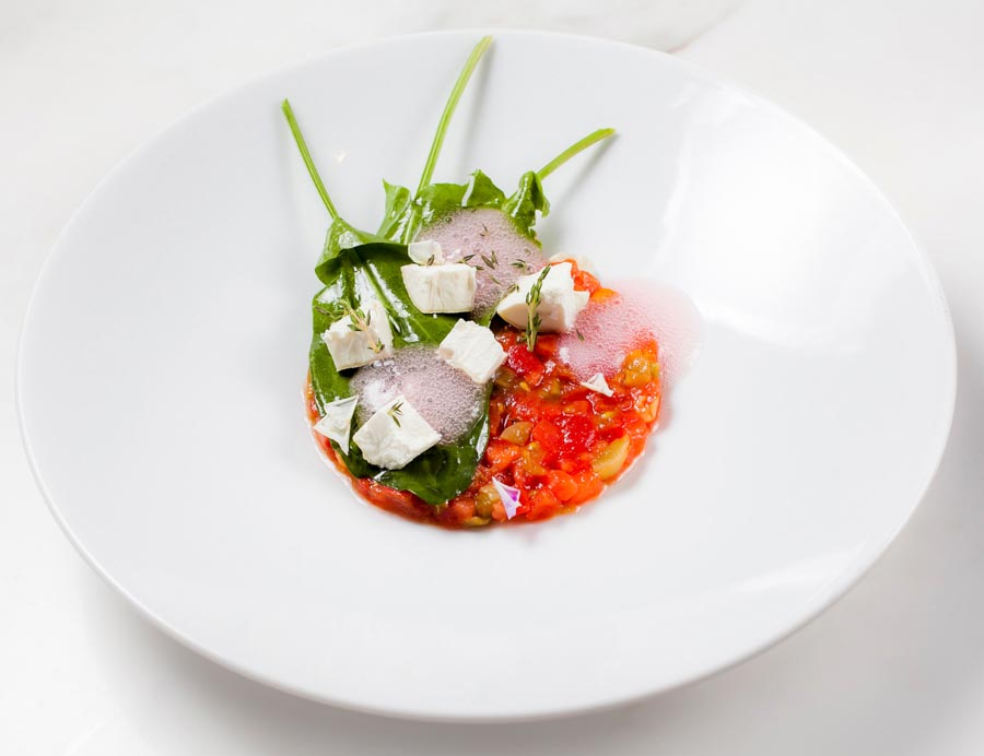 `Тартар из томатов с щавелем, козьим сыром и имбирно-гранатовой пеной` в ресторан `A Tavola` - официальное фото