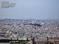 Вид с башни Монпорнас на Лувр и холм Монмартра - фото